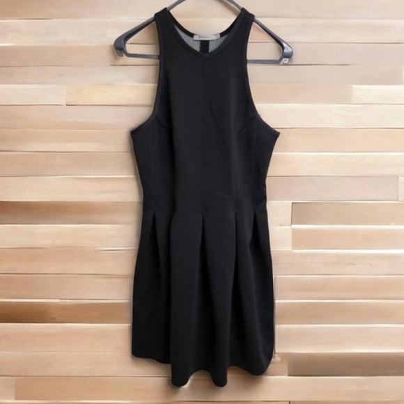 T by Alexander Wang Dresses & Skirts - Alexander Wang T black scuba material racer back dress.Size large see descriptio